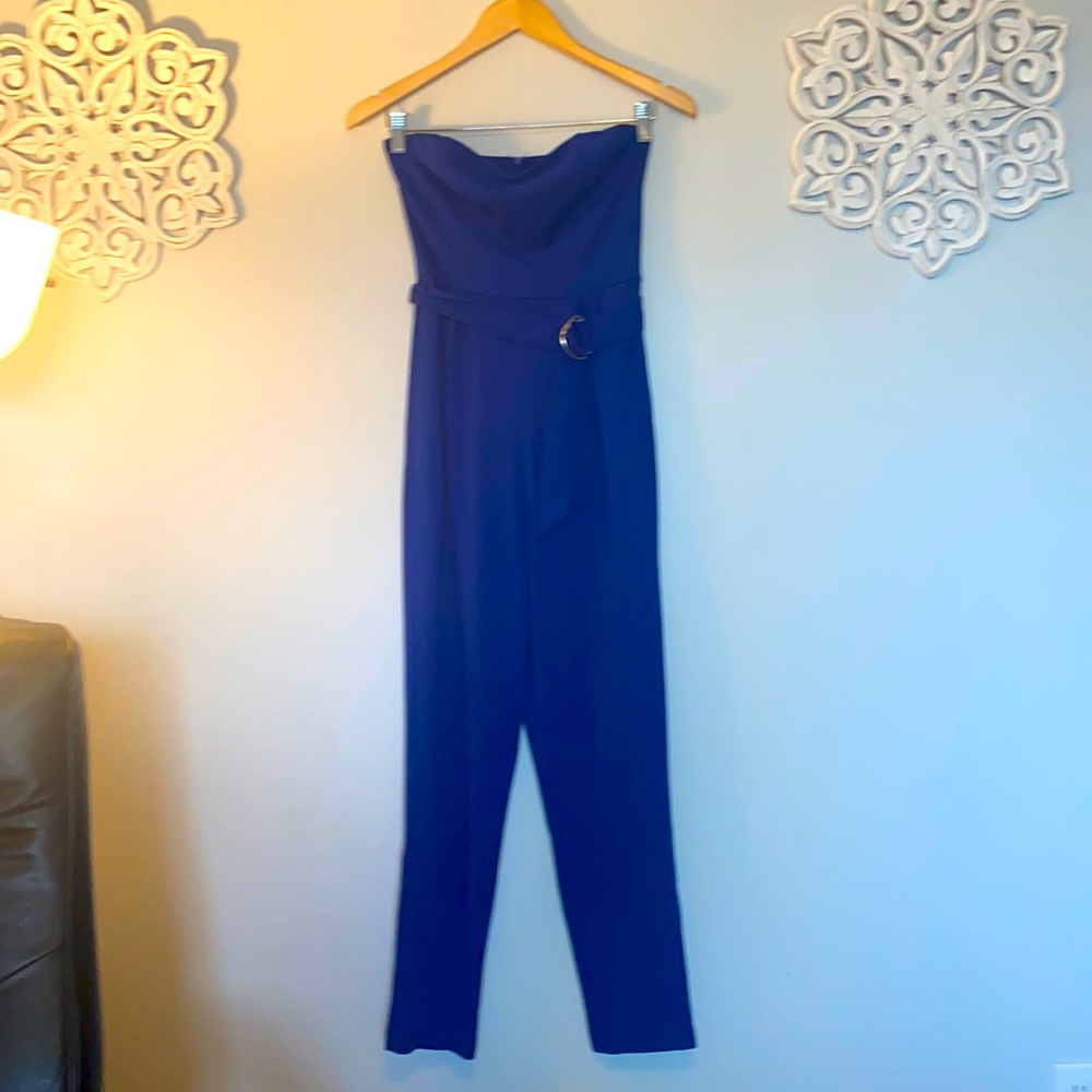 Blue strapless romper, with buckle.